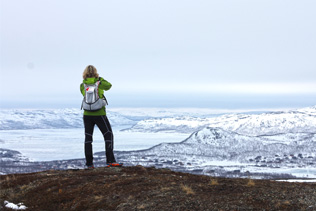 A person standing at the top of a fjell